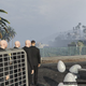 Random items and NPCs spawned right on top of a player in a GTA Online lobby.
